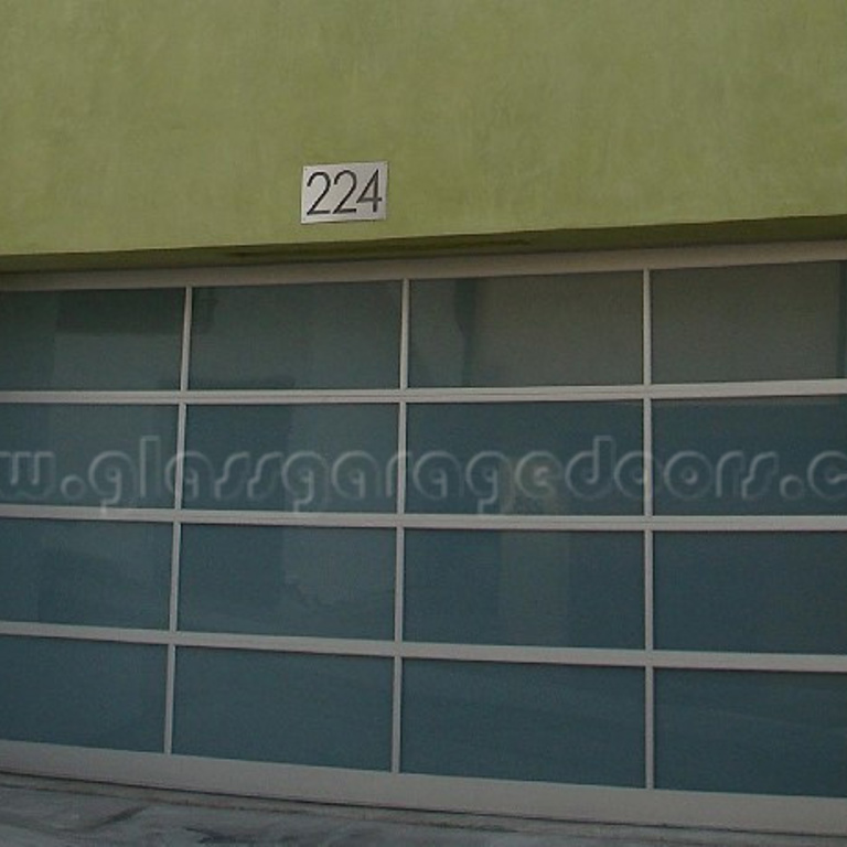 Contemporary glass garage door installation in Manhattan Beach 