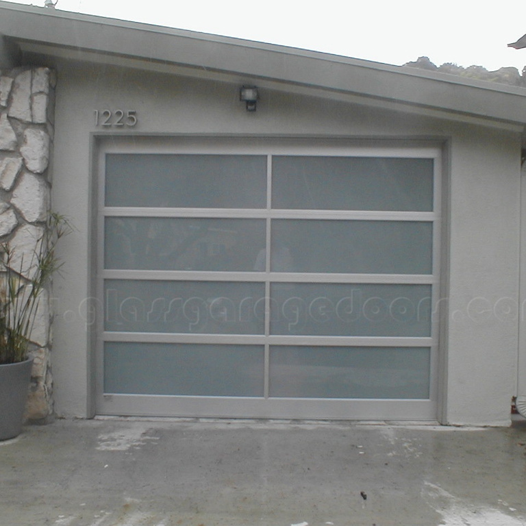 Custom glass garage door enhances aesthetic appeal of Santa Barbara home