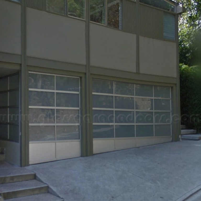 Glass Garage Doors with tapered bottom sections, installed in hollywood Hills Home in California