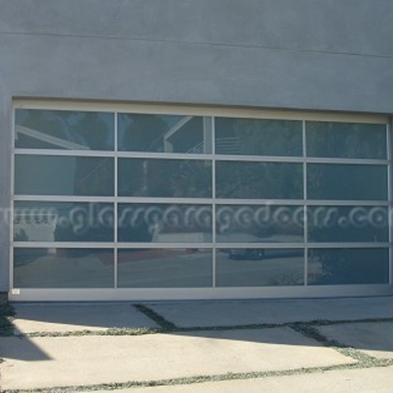 Contemporary glass garage door in San Diego, California, ideal for upscale residential properties