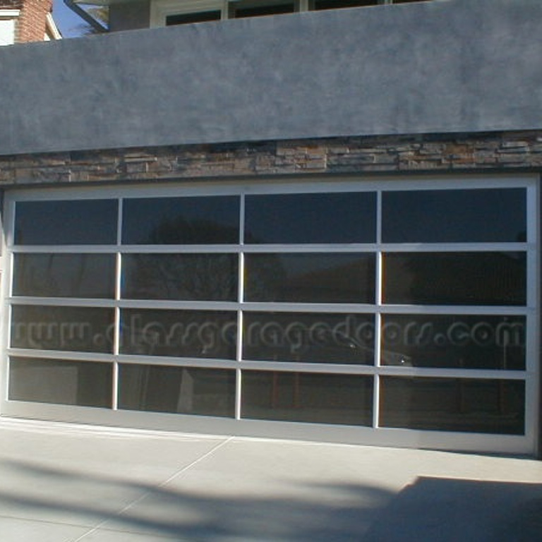 Contemporary glass garage door installation in Redondo Beach, California, designed for style and durability.