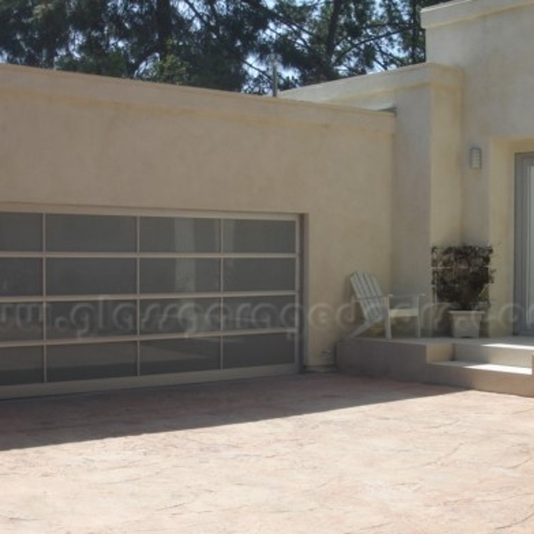 Glass garage door and Double entry door on Hutton Drive, Beverly Hills, showcasing modern design