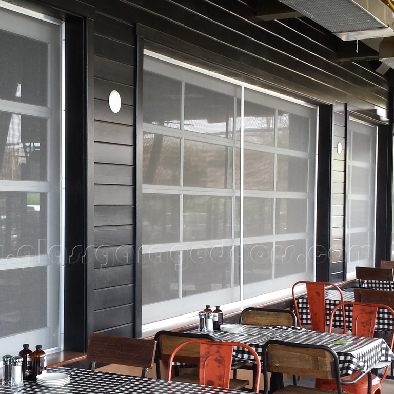 Elegant overhead glass shutter in a restaurant counter, designed for easy access and enhanced aesthetic appeal in dining areas