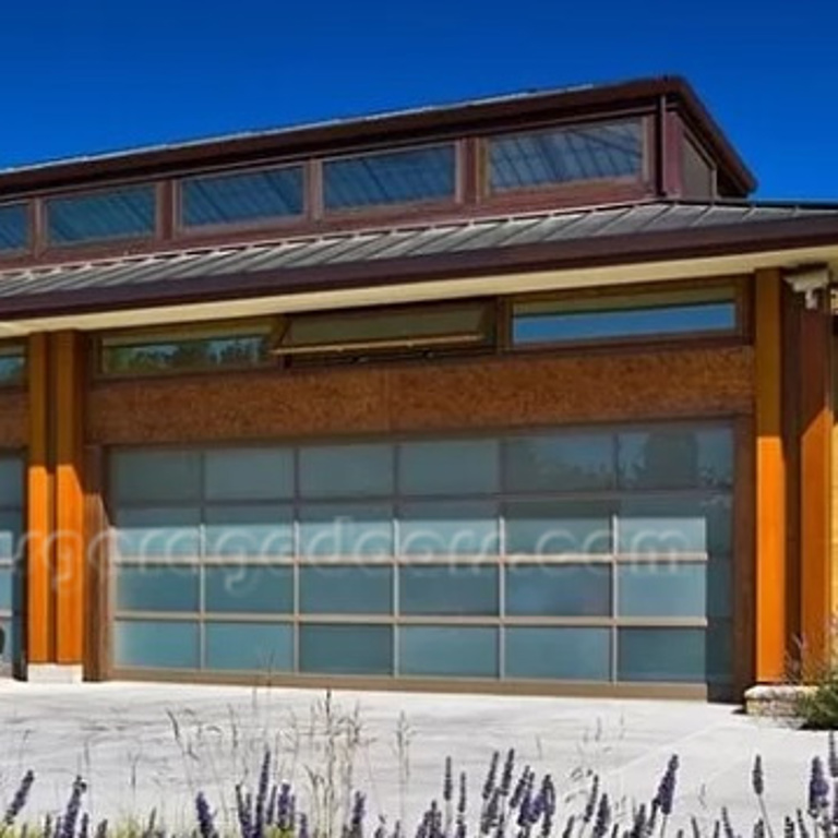 Large Glass Garage doors with matte satin glass and gray powder coated frame with black car 