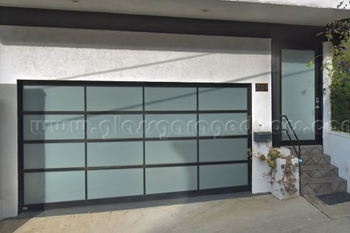 Dark powder coated aluminun glass garage door and entry door 