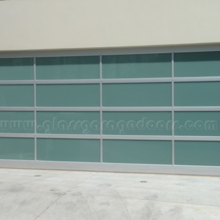 Contemporary residential glass garage door enhancing Revello Street, Pacific Palisades home exterior