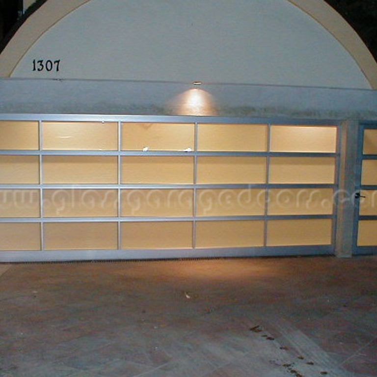 Beautiful glass garage doors in Santa Monica, California, perfect for enhancing the architectural appeal of luxury residences.