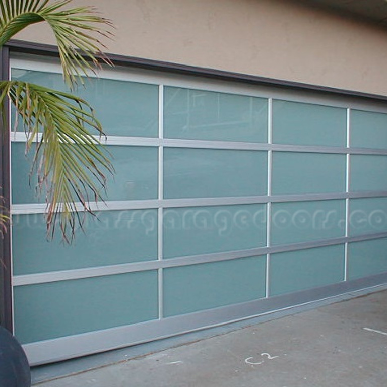 Modern glass garage door design for a home on Whittier St in San Diego, California