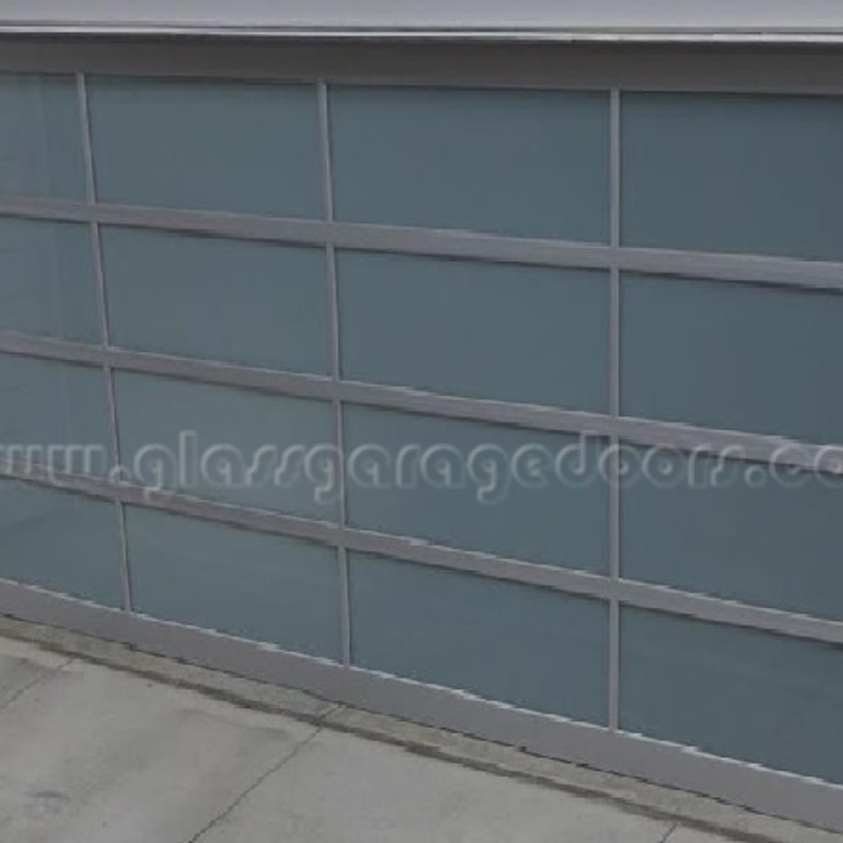 Glass garage door solution installed at a Santa Monica commercial building for improved accessibility and aesthetics