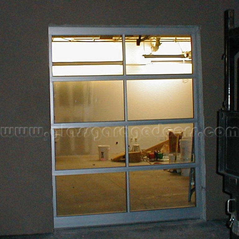 Contemporary office building in Irvine, CA, featuring a stylish glass garage door that enhances the property's design