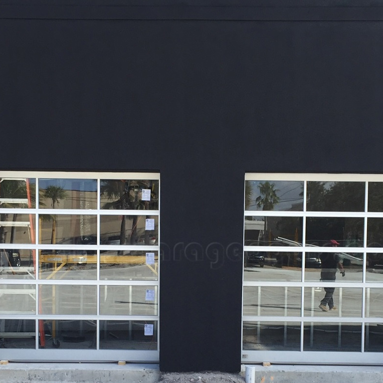 Pair of glass garage doors in restaurant in fort lauderdale, florida