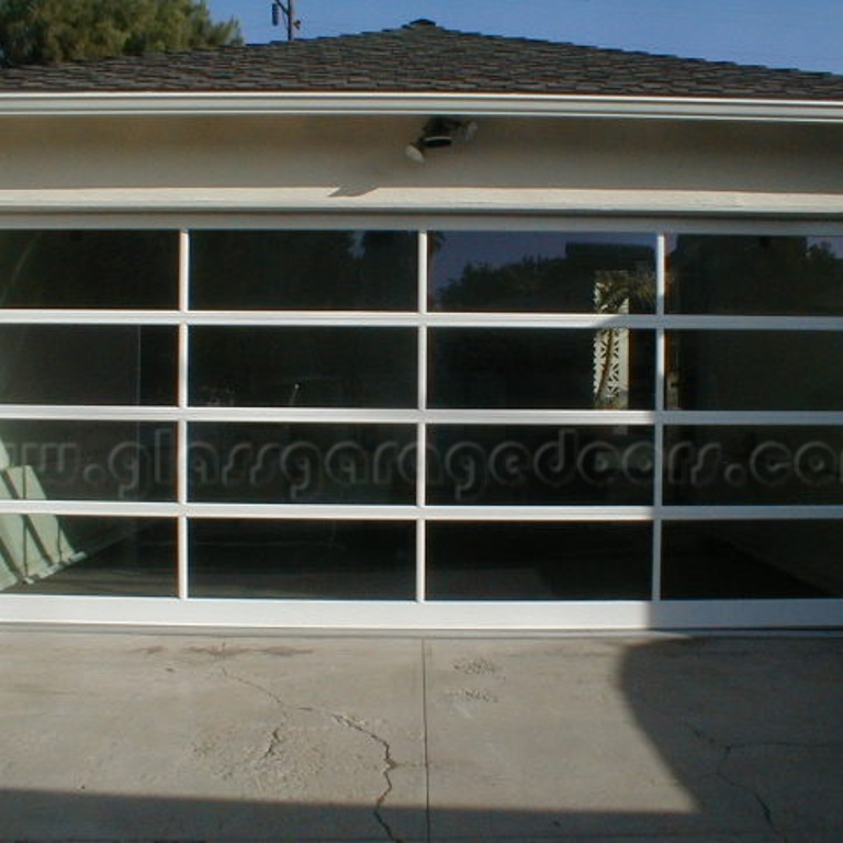 Contemporary glass garage door in Santa Monica, California, perfect for modern homes and urban living