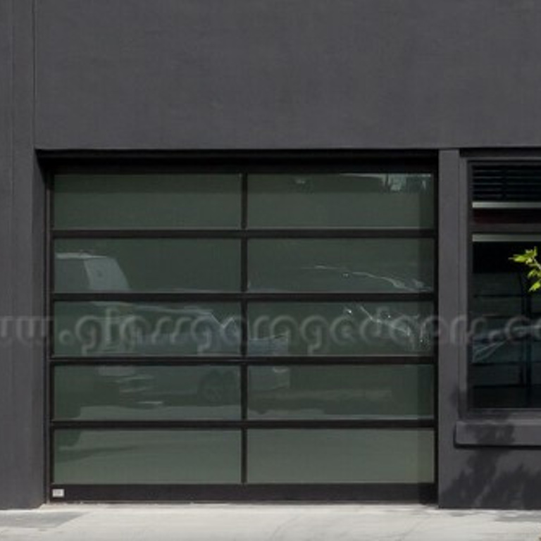 Modern residential black glass garage door on Harrison Street, San Francisco, California, 94103