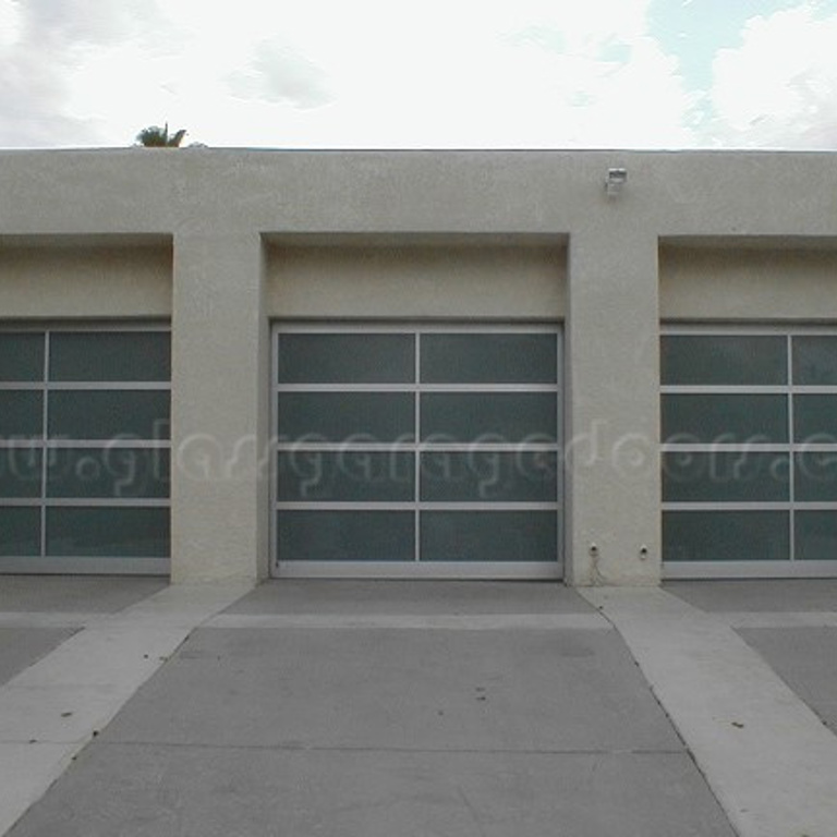 triple set of glass garage doors in luxury residence in palms springs, California