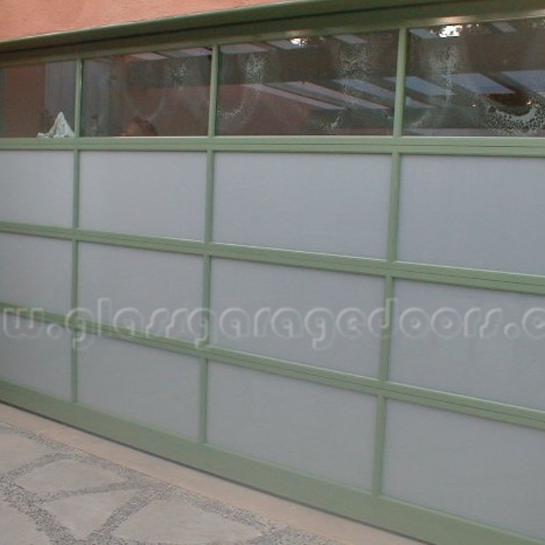 Green glass garage door installed in Kelton Avenue, Los Angeles, California