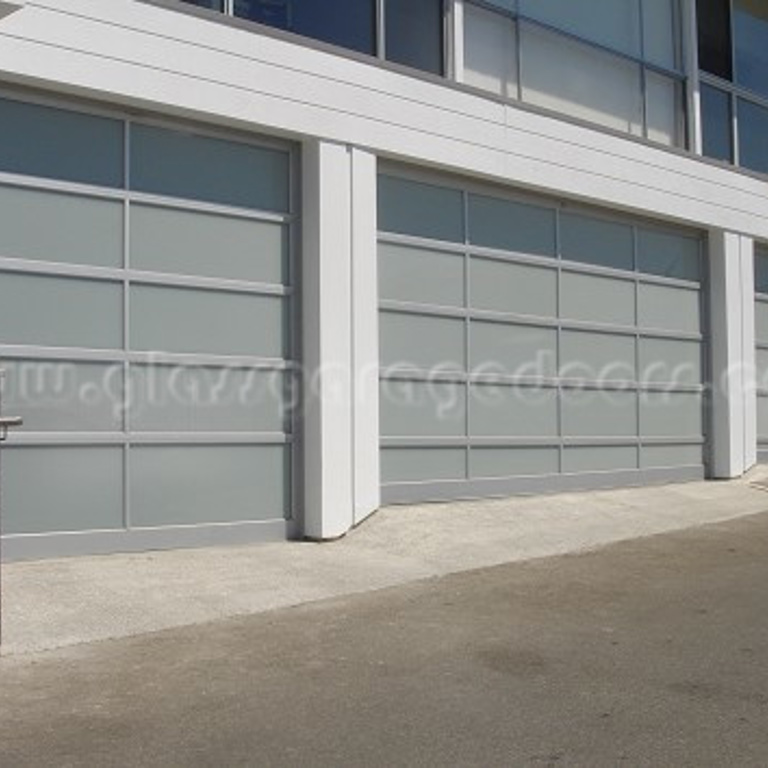 Three modern aluminum glass garage doors on Coastline Drive in Malibu, California