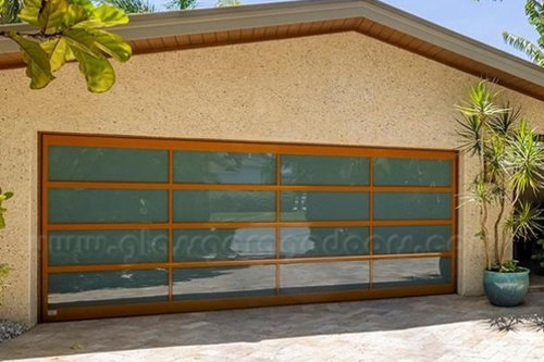 Hurricane-rated glass and aluminum panel garage door enhancing luxury Palm Harbor residence