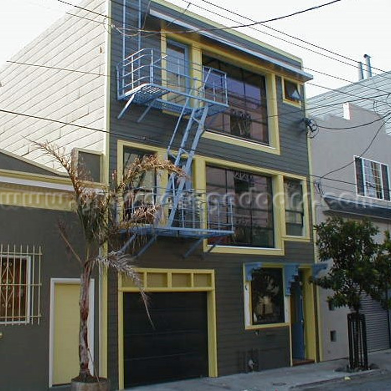 Modern glass garage door in a San Francisco loft on Clementina Street