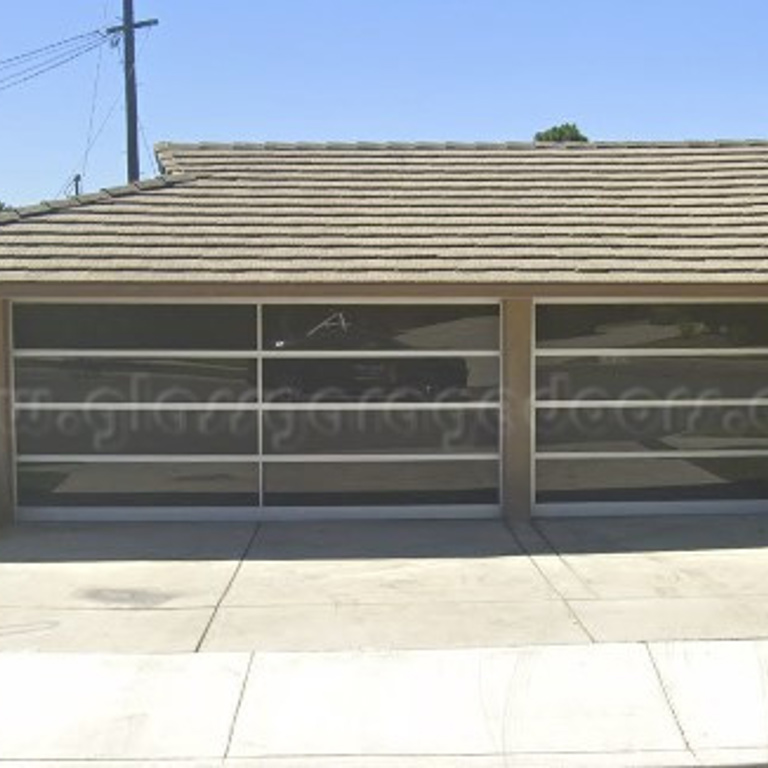 one double and one single glass garage doors located on Alvern Street, in los Angeles California