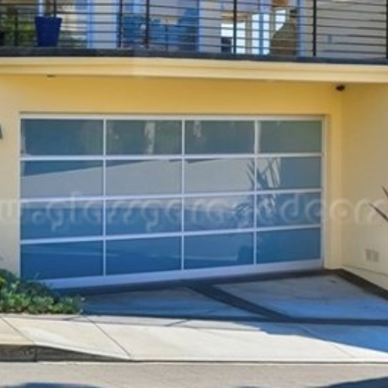 Elegant glass garage door installation showcasing beachside living in Manhattan Beach.