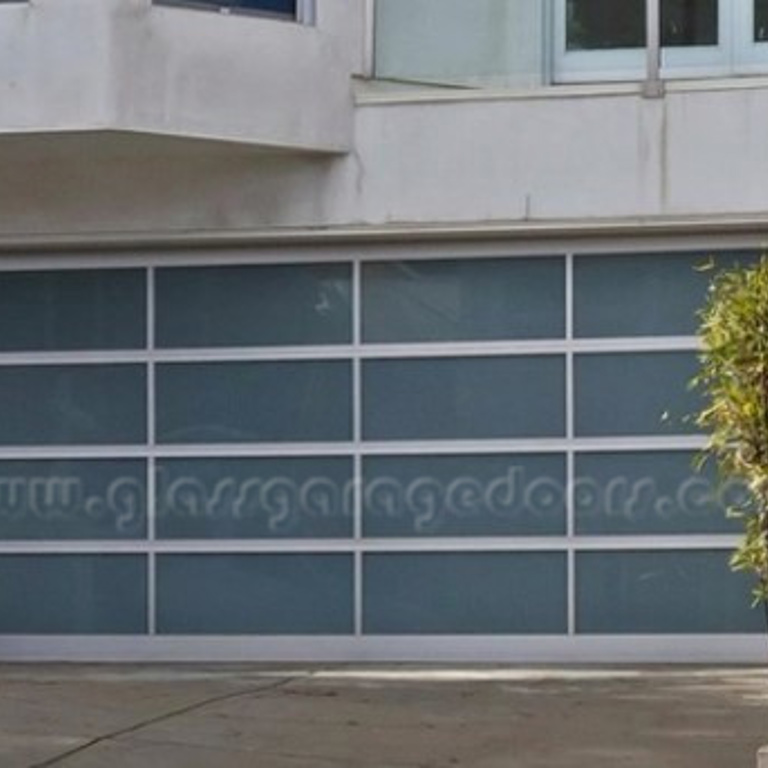 Modern aluminum residential glass garage door on Hamerton Avenue, San Francisco, 94124, California