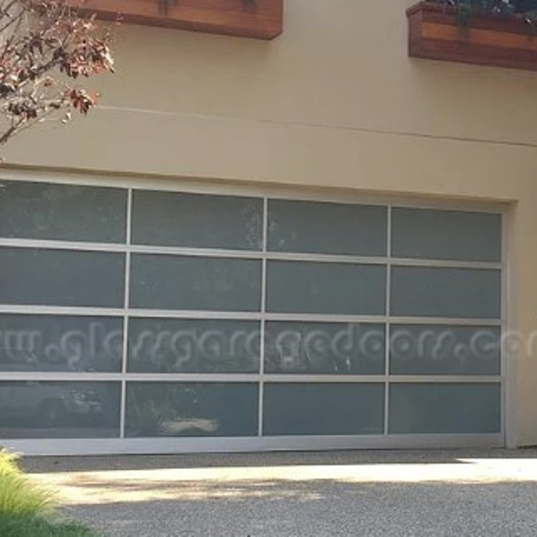 Stylish glass garage door enhancing the exterior of a home on Burrell Street in Marina del Rey California