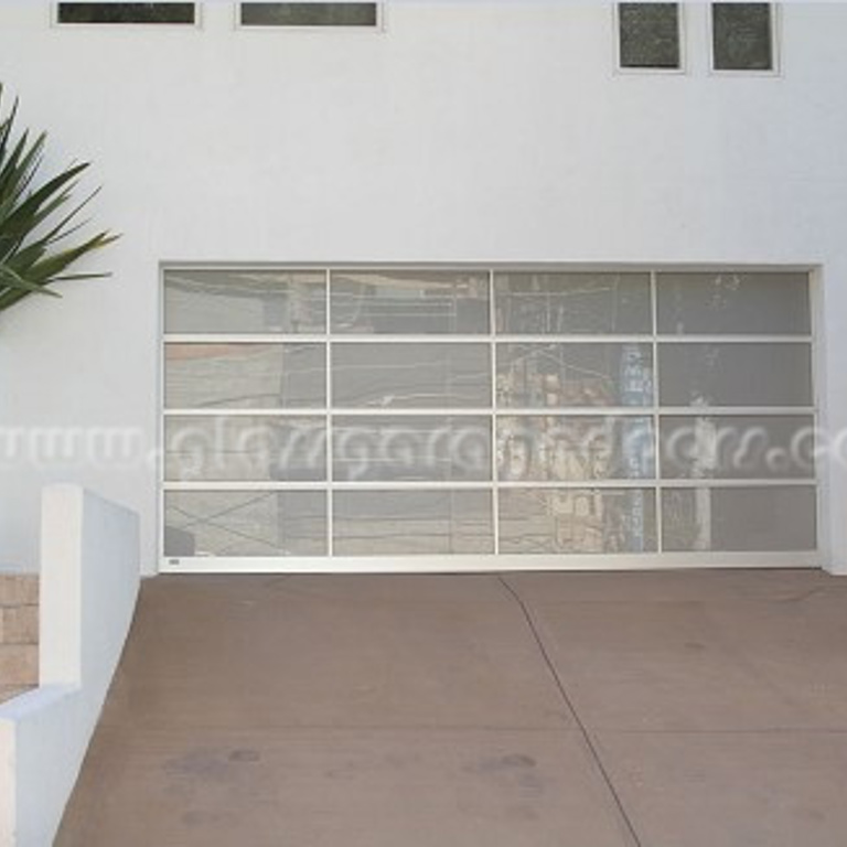 High-end glass garage door in Beverly Hills, California, enhancing curb appeal with a sophisticated, minimalist look