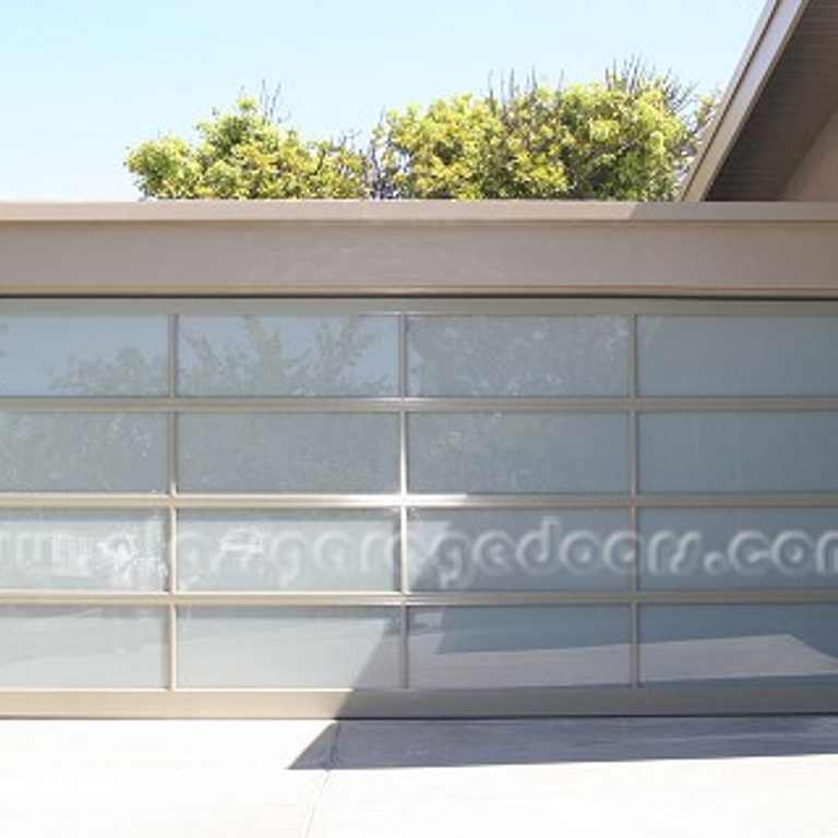 Beverly Hills contemporary home in Tower Grove Drive featuring a high-end glass garage door 