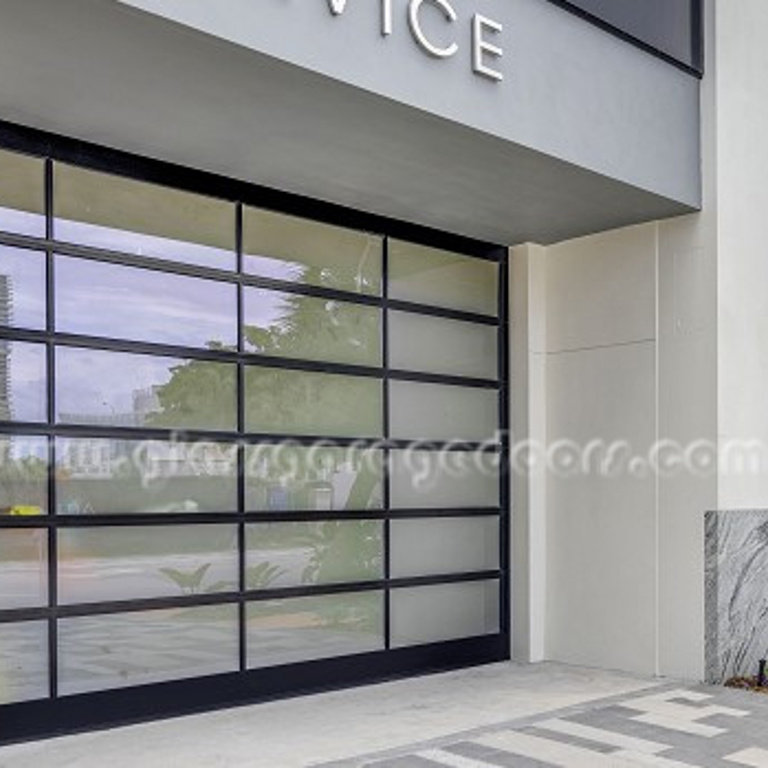 Glass Garage Door in car dealership service entrance in Miami Florida