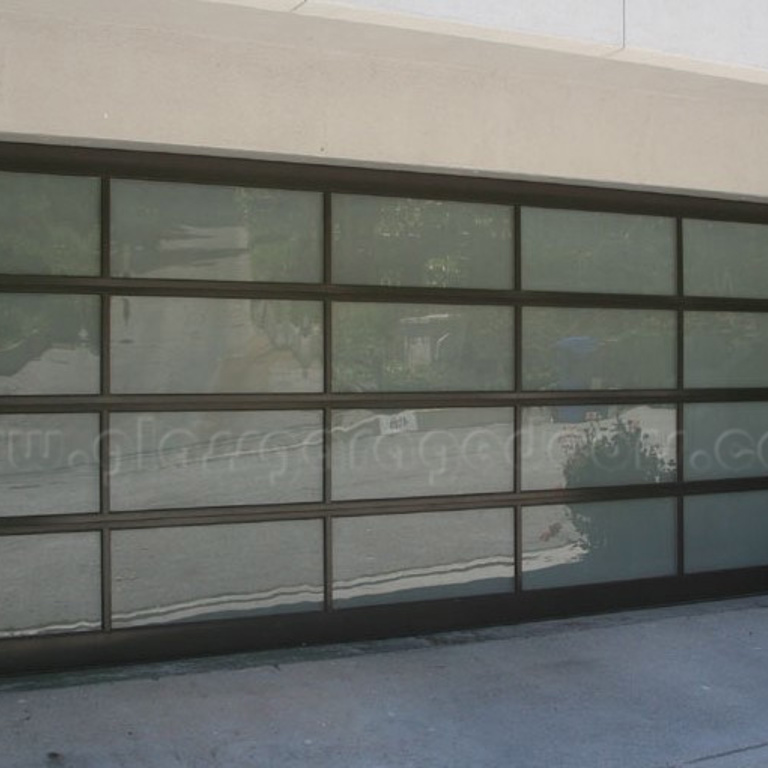 Glass garage door installed in brentwood residence