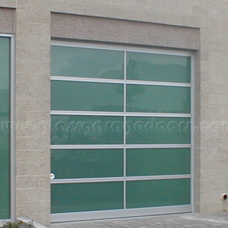 Irvine, California office building with a high-end glass garage door, reflecting modern architecture and innovative design.