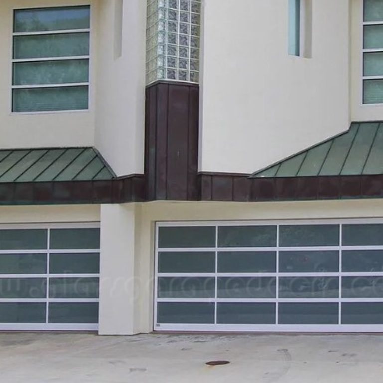 Glass Garage Doors Enhancing  Home's Driveway in Ventura California