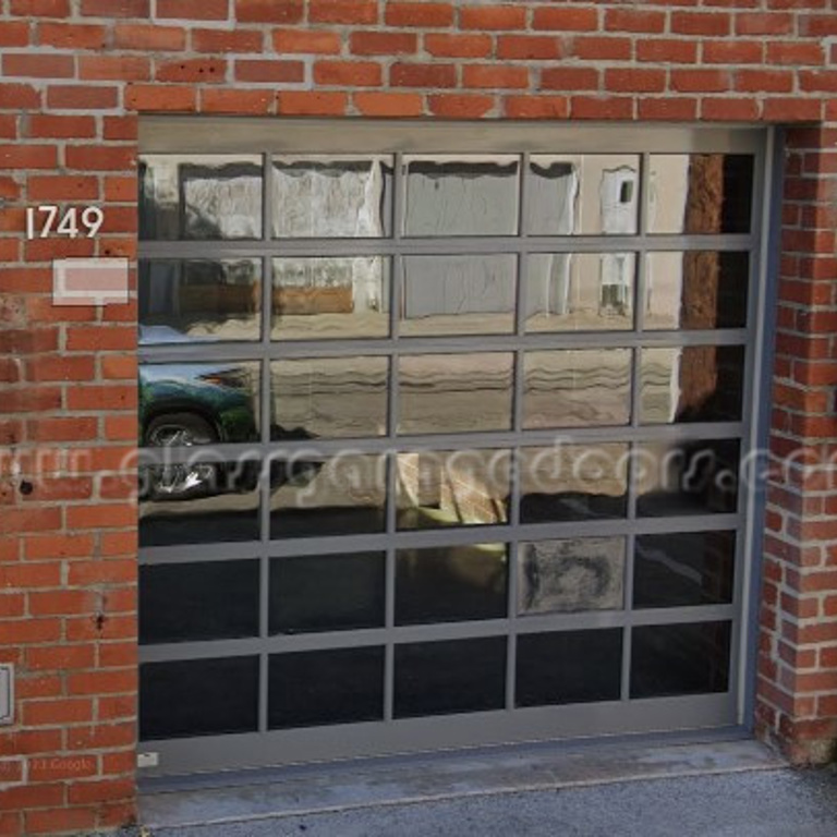 Glass garage door solution installed at a Santa Monica commercial building for improved accessibility and aesthetics