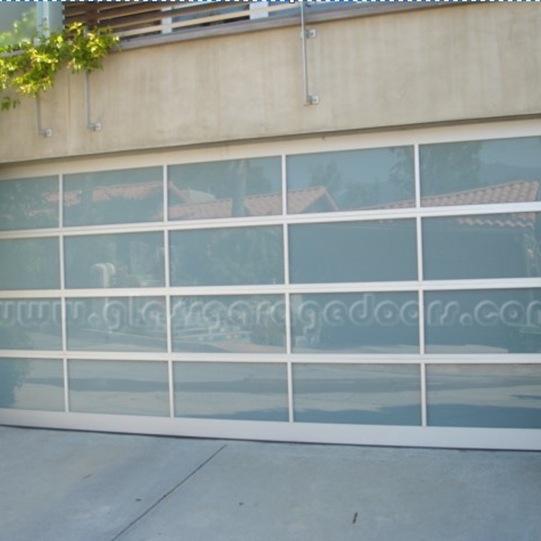 Architectural glass garage door adding sophistication to a Pacific Palisades residence