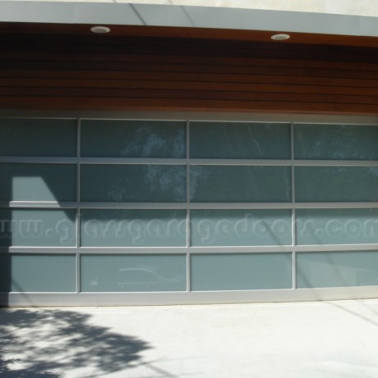 Elegant glass garage door for modern Pacific Palisades luxury home exterior